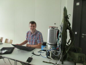 Prof. Nüchter (University of Würzburg) presenting his backpack-mounted 3D mobile scanning system (permission granted)